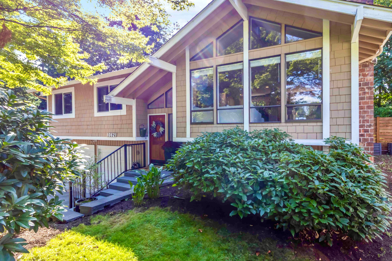 Beautiful light filled home with large windows and private yard.