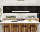 The gourmet kitchen is outfitted with Wolf and Sub-Zero appliances.
