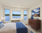 The third guest bedroom is virtually staged.