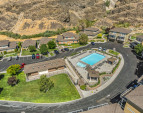 Aerial view of the property and surrounding amenities