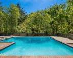 Your very own private retreat surrounded by tall trees. If you trim trees there is a possible view of the lake.
