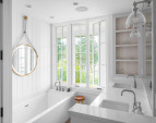 The five-piece bathroom offers a BainUltra “Citi” spa tub, a custom tiled shower stall.