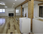 The dishwasher will be installed next to the plantation sink. Quartz countertops to cover every part of the island all the way around the center post. The first doorway to the right of center is the 3
