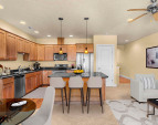 Open-concept kitchen with breakfast bar, perfect for casual dining or entertaining