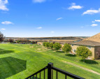 Lush lawn and mature landscaping