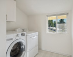 Easy access laundry right off bedrooms