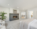 Primary bedroom suite with its own sitting area.