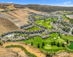 Aerial view of the property and surrounding amenities