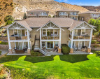 Elegant exterior with manicured landscaping and architectural charm