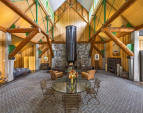 The stone flooring was designed, sculpted and built by hand. Each custom brick was tumbled to soften the corners.