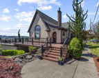 Stunning 3,870 SF historic Tudor style home on a rare double corner lot
