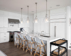 It also includes a 48" side-by-side Sub-Zero refrigerator, built-in GE 15" nugget ice maker, and a large pantry.
