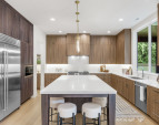 Sub-Zero refrigerator, Wolf six-burner range and Stainless steel Asko dishwasher.
