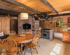 With five fireplaces throughout the home, this one is perfect for warming up a kettle or even for use as a cozy pizza oven, adding both charm and functionality to the space.