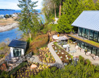 Modern, luxury waterfront home located in Port Madison with over 100 acres of hiking trails, a community dock, and beach. 