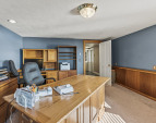 Lower level office with mahogany paneling