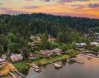 This exceptional waterfront home boasts 85' of prime lake frontage on a sprawling 0.58-acre lot. The rectangular lines are for demonstration purposes only & do not represent the actual property line.