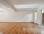 View towards kitchen and entry from slider off deck.