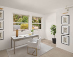 This room is the perfect office space, complete with an adjoining sitting room, ideal for relaxation or informal meetings.