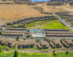 Aerial view of the property and surrounding amenities