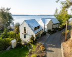 This popular neighborhood, Port Madison, offers a private beach, dock, and 100 acres of beautiful hiking trails. Welcome home to your personal retreat!