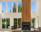 20' ceilings with double stacked windows and impressive fireplace