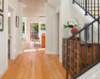 Gleaming solid wood floors grace the homes entry, living spaces and bedrooms. Gleaming solid wood floors grace the homes entry, living spaces and bedrooms.