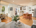 A gracious open floor plan provides comfortable living spaces warmed by the stained wood paneled ceilings. A gracious open floor plan provides comfortable living spaces warmed by the stained wood paneled ceilings.