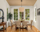 A stunning large dining room space overlooks the woodland and creek beyond. A stunning large dining room space overlooks the woodland and creek beyond.