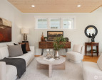 The comfortable living room overlooks dining and the cook's kitchen. The comfortable living room overlooks dining and the cook's kitchen.