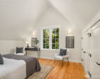 One of two vaulted ceiling bedroom spaces upstairs. This overlooks the gardens and woodland beyond. Large walk in closets with exceptional storage. One of two vaulted ceiling bedroom spaces upstairs. This overlooks the gardens and woodland beyond. Large walk in closets with exceptional storage.