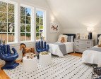 The second of two upstairs vaulted ceiling bedrooms is filled with light from it's westerly exposure. The second of two upstairs vaulted ceiling bedrooms is filled with light from it's westerly exposure.
