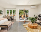 Explore the downstairs studio/flex space with polished concrete floors, wetbar and separate private entry to a patio and fenced rear yard. Explore the downstairs studio/flex space with polished concrete floors, wetbar and separate private entry to a patio and fenced rear yard.