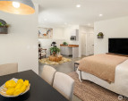 The lower level studio/flex space includes a wet bar with microwave and under counter refrigerator. The lower level studio/flex space includes a wet bar with microwave and under counter refrigerator.