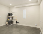 The lower level includes a very large utility storage space with room for a washer/dryer and lots of storage! The lower level includes a very large utility storage space with room for a washer/dryer and lots of storage!