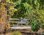 Garden benches are placed throughout the common area gardens. Come and sit a spell? Garden benches are placed throughout the common area gardens. Come and sit a spell?