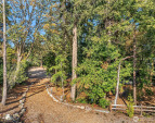 A 1.5 acre arboretum-like private open space borders the northerly side of the community. This open space is in the private ownership of the 9 owners of Thornton Creek Commons for their private use and enjoyment. A 1.5 acre arboretum-like private open space borders the northerly side of the community. This open space is in the private ownership of the 9 owners of Thornton Creek Commons for their private use and enjoyment.