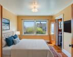 Upstairs: Primary bedroom virtually staged. Upstairs: Primary bedroom virtually staged.