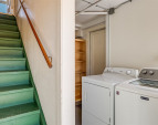 Stairwell still connects the two floors. There is a laundry and storage area that separates the two. Each unit has a door that locks to this shared space. Stairwell still connects the two floors. There is a laundry and storage area that separates the two. Each unit has a door that locks to this shared space.