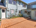 Fenced in back deck with southern exposure. Fenced in back deck with southern exposure.