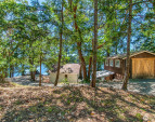 Two vintage cabins on a half acre lot. Two vintage cabins on a half acre lot.