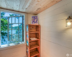 Main floor nook area with water views. Main floor nook area with water views.