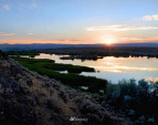 Beautiful vistas. Sun setting in the West. Mountain ridges ideal for home-sites. Additional sites around the lake provide dramatic vistas for additional home-sites. Hilltop Lake below with island in middle. Beautiful vistas. Sun setting in the West. Mountain ridges ideal for home-sites. Additional sites around the lake provide dramatic vistas for additional home-sites. Hilltop Lake below with island in middle.