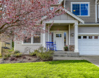 Approach to the covered  front porch.