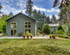 Two homes on one lot with incredible privacy and space for being in-town and so close to everything!