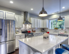 Gorgeous Quartz counters, huge eat-in-island, tile backsplash, newer S/S appliances!