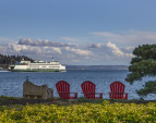 Watch the ferries glide by day and night.