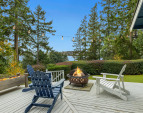 The deck, located off the living room, dining room and "garden room"