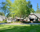 1.2+ acres: Manicured lawns, colorful gardens