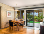The dining room is open to the back patio for dining al-fresco.
